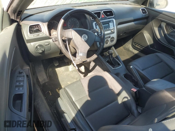 2008 Volkswagen Eos Turbo z VIN WVWAA71F18V049221, wystawiony jako Copart lot #75855374 z przebiegiem 157 657 mil mil oraz Szkoda całkowita • Salvage title. Historia ofert i sprzedaży dostępna na DreamBid. Obrazek 8.