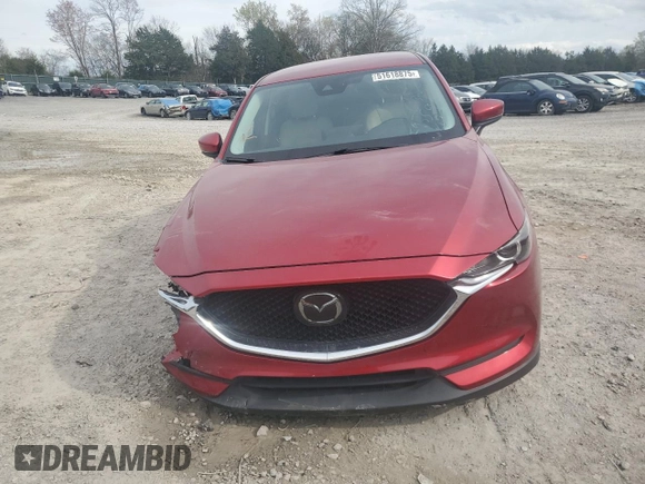 2021 Mazda CX-5 Touring with VIN JM3KFACM7M0334633, listed as a Copart auction lot 51618875 with 70,558 mi miles and Salvage Title. Bid and sale history available at DreamBid. Image 5.