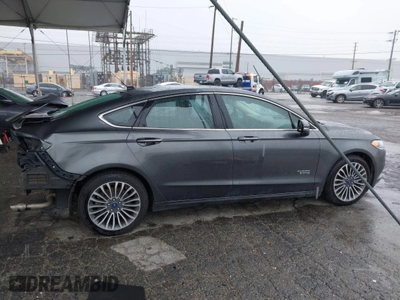 2017 Ford Fusion Titanium with VIN 3FA6P0SU8HR329570, listed as a IAAI auction lot 41773023 with 112,022 mi miles and . Bid and sale history available at DreamBid. Image 14.