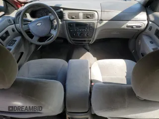 2005 Ford Taurus SE z VIN 1FAFP53U35A106807, wystawiony jako Copart lot #57023025 z przebiegiem 168 727 mil mil oraz Szkoda całkowita • Salvage title. Historia ofert i sprzedaży dostępna na DreamBid. Obrazek 8.