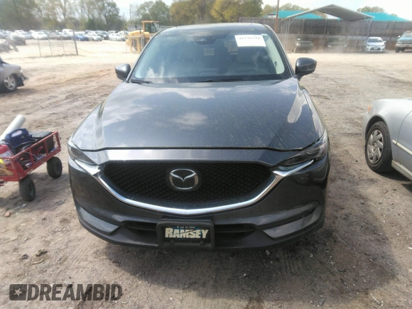 2019 Mazda CX-5 Grand Touring with VIN JM3KFBDM7K0606860, listed as a IAAI auction lot 41936338 with 93,057 mi miles. Bid and sale history available at carsss.com. Image 12.