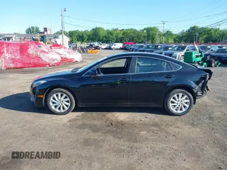 2012 Mazda 6 i Touring with VIN 1YVHZ8DH2C5M23669, listed as a IAAI auction lot 42247758 with 123,389 mi miles and . Bid and sale history available at DreamBid. Image 14.