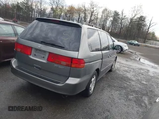 2000 Honda Odyssey EX with VIN 2HKRL1866YH011399, listed as a IAAI auction lot 41858608 with Not Provided miles and . Bid and sale history available at DreamBid. Image 4.