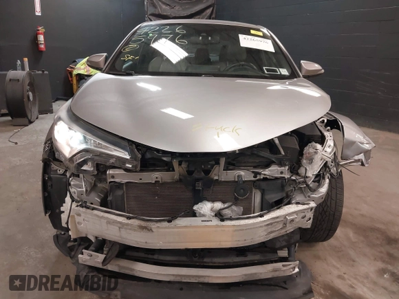 2018 Toyota C-HR XLE z VIN NMTKHMBX5JR039263, wystawiony jako IAAI lot #42265976 z przebiegiem 88 253 mil mil oraz . Historia ofert i sprzedaży dostępna na DreamBid. Obrazek 6.