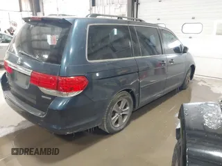 2010 Honda Odyssey Touring with VIN 5FNRL3H98AB095042, listed as a IAAI auction lot 41394894 with 254,525 mi miles. Bid and sale history available at carsss.com. Image 4.