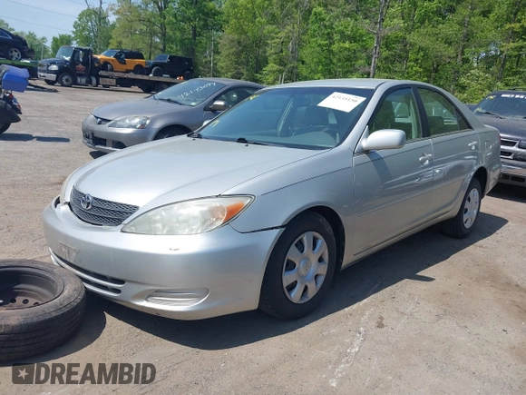 2004 Toyota Camry LE with VIN 4T1BE32K24U817748, listed as a IAAI auction lot 42155150 with 158,437 mi miles and . Bid and sale history available at DreamBid. Image 2.