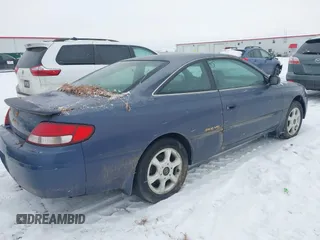 1999 Toyota Solara SE with VIN 2T1CF22P0XC131964, listed as a IAAI auction lot 41573319 with 249,870 mi miles. Bid and sale history available at carsss.com. Image 4.