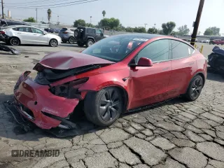 2024 Tesla Model Y with VIN 7SAYGDED3RF166676, listed as a Copart auction lot 60792165 with 22,445 mi miles and Salvage title. Bid and sale history available at DreamBid. Image 1.