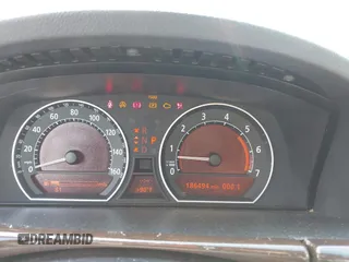 2006 BMW 7 Series 750i with VIN WBAHL83576DT03355, listed as a IAAI auction lot 42606906 with 186,494 mi miles and . Bid and sale history available at DreamBid. Image 7.