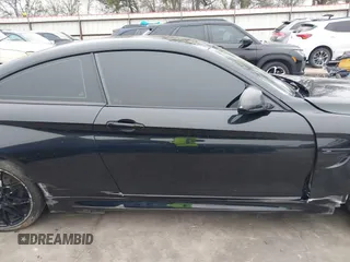 2019 BMW M4 with VIN WBS4Y9C53KAH82910, listed as a IAAI auction lot 41570315 with 59,227 mi miles. Bid and sale history available at carsss.com. Image 18.