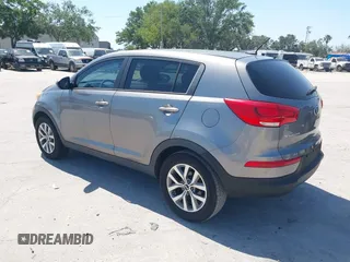 2014 Kia Sportage LX with VIN KNDPB3AC7E7595527, listed as a IAAI auction lot 42062615 with 64,777 mi miles. Bid and sale history available at carsss.com. Image 3.