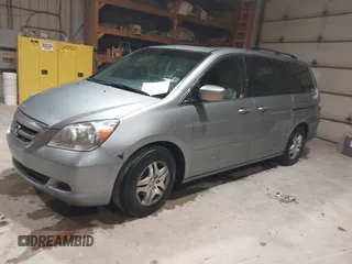 2007 Honda Odyssey EX-L with VIN 5FNRL38697B012944, listed as a IAAI auction lot 42144250 with 234,016 mi miles and . Bid and sale history available at DreamBid. Image 2.