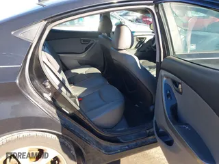 2013 Hyundai Elantra GLS PZEV with VIN KMHDH4AE4DU574977, listed as a IAAI auction lot 41608098 with 116,899 mi miles. Bid and sale history available at carsss.com. Image 8.
