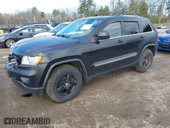 2011 Jeep Grand Cherokee Laredo with VIN 1J4RR4GG5BC670369, listed as a IAAI auction lot 41892892 with 164,807 mi miles and . Bid and sale history available at DreamBid. Image 2.