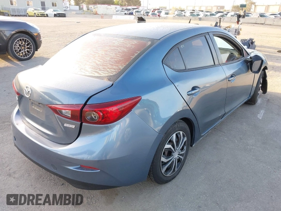 2015 Mazda 3 i Sport with VIN 3MZBM1U75FM145709, listed as a IAAI auction lot 41950471 with 124,407 mi miles and . Bid and sale history available at carsss.com. Image 4.