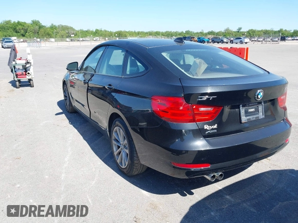 2014 BMW 3 Series 328i Gran Turismo xDrive with VIN WBA3X5C51ED557347, listed as a IAAI auction lot 42028680 with 178,469 mi miles and . Bid and sale history available at DreamBid. Image 3.