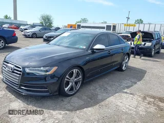 2014 Audi S6 Prestige z VIN WAUF2AFC9EN058417, wystawiony jako IAAI lot #42236333 z przebiegiem 58 257 mil mil oraz . Historia ofert i sprzedaży dostępna na DreamBid. Obrazek 2.