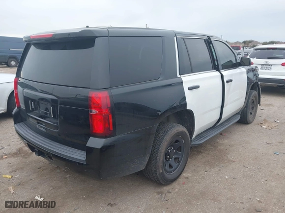 2018 Chevrolet Tahoe Commercial with VIN 1GNLCDEC1JR312458, listed as a IAAI auction lot 41371563 with 114,086 mi miles. Bid and sale history available at carsss.com. Image 4.