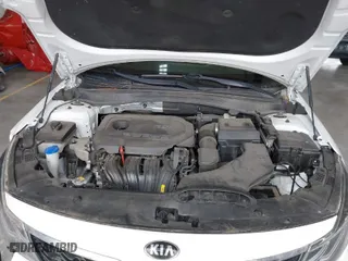 2019 Kia Optima LX with VIN 5XXGT4L37KG320078, listed as a IAAI auction lot 41598649 with 128,439 mi miles. Bid and sale history available at carsss.com. Image 10.