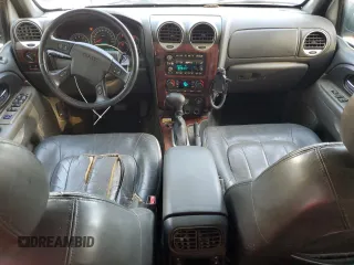 2002 GMC Envoy SLT with VIN 1GKDS13S822460095, listed as a Copart auction lot 77004764 with 267,716 mi miles and Salvage Title. Bid and sale history available at carsss.com. Image 8.
