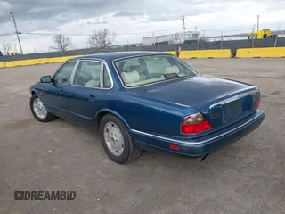 1996 Jaguar XJ with VIN SAJHX1743TC759842, listed as a IAAI auction lot 41778155 with 189,315 mi miles and . Bid and sale history available at DreamBid. Image 3.