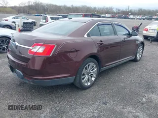 2010 Ford Taurus Limited with VIN 1FAHP2FW6AG144074, listed as a IAAI auction lot 41945777 with 135,096 mi miles. Bid and sale history available at carsss.com. Image 4.