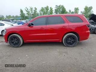 2015 Dodge Durango SXT with VIN 1C4RDJAG2FC128082, listed as a IAAI auction lot 42447872 with 141,655 mi miles and . Bid and sale history available at DreamBid. Image 13.