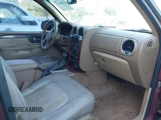 2003 GMC Envoy SLT with VIN 1GKDS13S132118361, listed as a IAAI auction lot 41909425 with 283,342 mi miles. Bid and sale history available at carsss.com. Image 5.