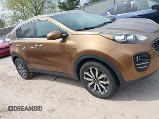 2017 Kia Sportage EX z VIN KNDPNCAC3H7113373, wystawiony jako IAAI lot #42221002 z przebiegiem 112 931 mil mil oraz . Historia ofert i sprzedaży dostępna na DreamBid. Obrazek 13.