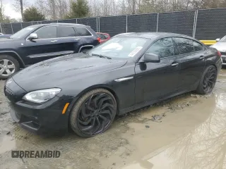 2015 BMW 6 Series 640i xDrive with VIN WBA6B8C5XFD453762, listed as a Copart auction lot 44228965 with 105,188 mi miles and Salvage Title. Bid and sale history available at carsss.com. Image 1.