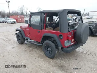 1999 Jeep Wrangler SE with VIN 1J4FY29P6XP408738, listed as a IAAI auction lot 41716999 with 124,692 mi miles. Bid and sale history available at carsss.com. Image 3.