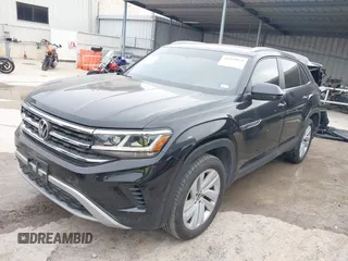 2023 Volkswagen Atlas SE z VIN 1V2KE2CA8PC225834, wystawiony jako IAAI lot #41330975 z przebiegiem 13 629 mil mil oraz . Historia ofert i sprzedaży dostępna na DreamBid. Obrazek 2.
