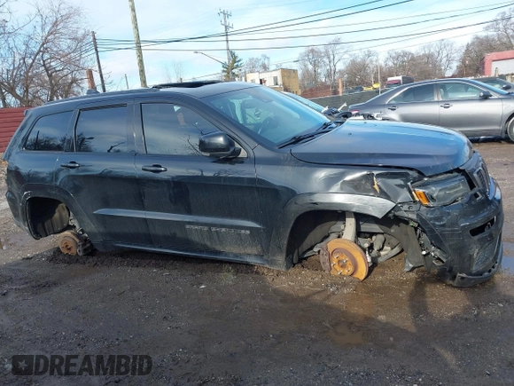 2018 Jeep Grand Cherokee High Altitude with VIN 1C4RJFCT9JC325436, listed as a IAAI auction lot 41189143 with 116,785 mi miles. Bid and sale history available at carsss.com. Image 12.