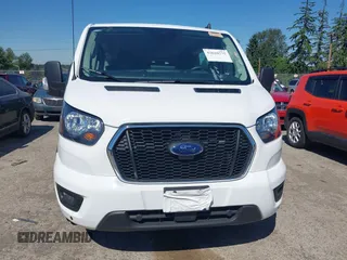2024 Ford Transit Passenger XL z VIN 1FBAX2Y88RKA11307, wystawiony jako IAAI lot #42620775 z przebiegiem 13 624 mil mil oraz . Historia ofert i sprzedaży dostępna na DreamBid. Obrazek 12.