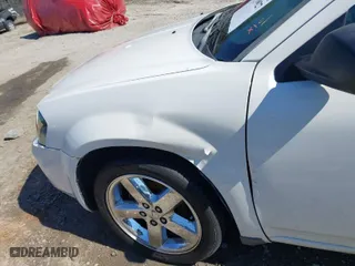 2009 Dodge Avenger SE with VIN 1B3LC46B59N509541, listed as a IAAI auction lot 41710027 with 151,209 mi miles. Bid and sale history available at carsss.com. Image 6.