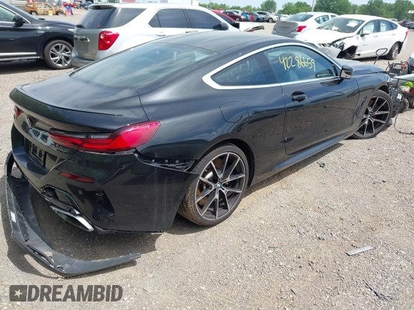 2019 BMW 8 Series M850i xDrive with VIN WBABC4C59KBU96788, listed as a IAAI auction lot 42286659 with 26,913 mi miles and . Bid and sale history available at DreamBid. Image 4.