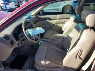 1998 Acura CL Premium z VIN 19UYA2253WL001513, wystawiony jako Copart lot #86998034 z przebiegiem 123 918 mil mil oraz Szkody całkowita. Historia ofert i sprzedaży dostępna na DreamBid. Obrazek 7.