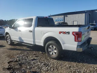 2015 Ford F-150 XLT w/HD Payload Pkg with VIN 1FTFW1EG1FKD03354, listed as a Copart auction lot 87190684 with 185,579 mi miles and Salvage Title. Bid and sale history available at carsss.com. Image 2.