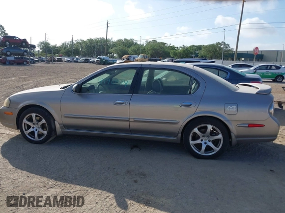 2003 Nissan Maxima GLE z VIN JN1DA31A83T411224, wystawiony jako IAAI lot #41905714 z przebiegiem Nie podano mil oraz . Historia ofert i sprzedaży dostępna na DreamBid. Obrazek 14.