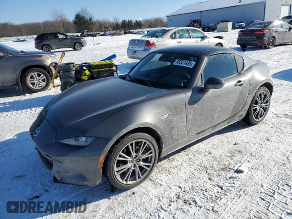 2024 Mazda MX-5 Miata Grand Touring z VIN JM1NDAM73R0607806, wystawiony jako Copart lot #88531435 z przebiegiem 3 089 mil mil oraz Szkoda całkowita • Salvage title. Historia ofert i sprzedaży dostępna na DreamBid. Obrazek 1.