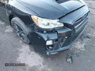 2015 Subaru WRX with VIN JF1VA1A60F9831858, listed as a IAAI auction lot 41360764 with 99,199 mi miles. Bid and sale history available at carsss.com. Image 6.