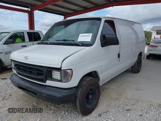 2001 Ford Econoline Cargo with VIN 1FTRE14261HA22632, listed as a IAAI auction lot 41202164 with 153,412 mi miles and . Bid and sale history available at DreamBid. Image 2.