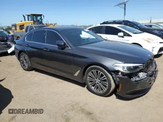 2018 BMW 5 Series 530e with VIN WBAJA9C52JB249402, listed as a Copart auction lot 55093055 with 117,033 mi miles and Salvage title. Bid and sale history available at DreamBid. Image 4.