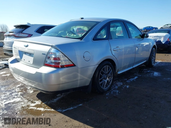 2009 Ford Taurus SEL with VIN 1FAHP24W79G106500, listed as a IAAI auction lot 41833230 with 133,055 mi miles. Bid and sale history available at carsss.com. Image 4.