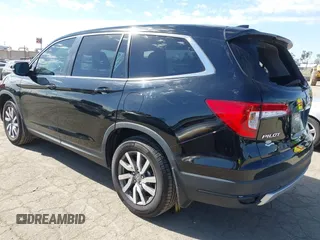 2020 Honda Pilot EX-L with VIN 5FNYF5H54LB009448, listed as a IAAI auction lot 41697106 with 63,310 mi miles. Bid and sale history available at carsss.com. Image 3.