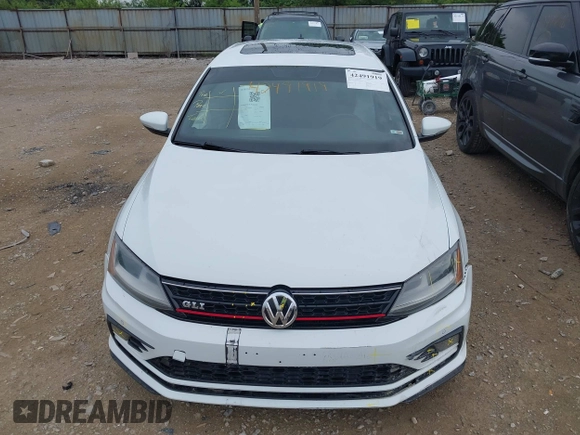 2017 Volkswagen Jetta GLI z VIN 3VW4T7AJ8HM349440, wystawiony jako IAAI lot #42491919 z przebiegiem 141 764 mil mil oraz . Historia ofert i sprzedaży dostępna na DreamBid. Obrazek 13.