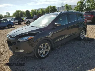 2015 Ford Escape Titanium with VIN 1FMCU9J92FUA35882, listed as a Copart auction lot 61772205 with 121,069 mi miles and Salvage title. Bid and sale history available at DreamBid. Image 1.