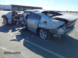 2019 Dodge Charger SXT with VIN 2C3CDXBG1KH702657, listed as a IAAI auction lot 41678259 with Not Provided miles and . Bid and sale history available at DreamBid. Image 3.
