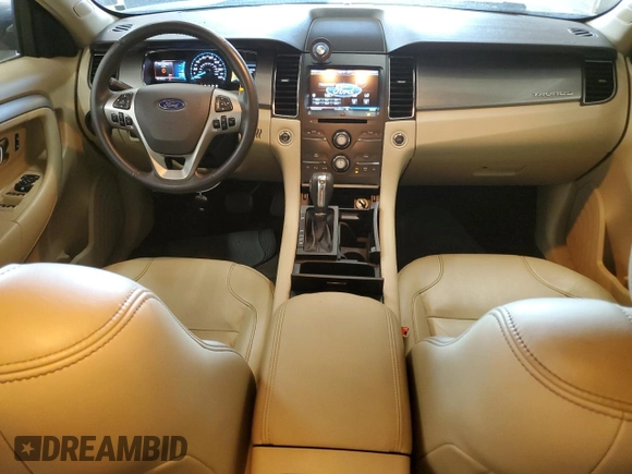 2015 Ford Taurus SEL with VIN 1FAHP2E84FG102318, listed as a Copart auction lot 61744685 with 82,149 mi miles and Salvage title. Bid and sale history available at DreamBid. Image 8.