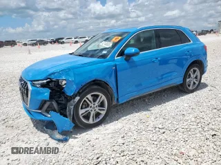 2020 Audi Q3 S line Premium with VIN WA1DECF38L1057660, listed as a Copart auction lot 62148085 with 104,578 mi miles and Salvage title. Bid and sale history available at DreamBid. Image 1.